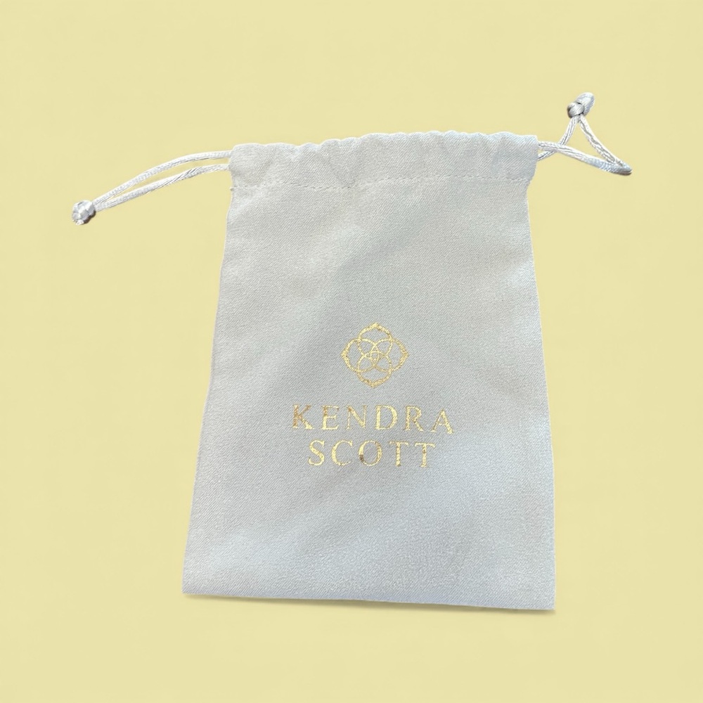 Kendra Scott Light Gray Pouch with Gold Logo 5 x 3 “